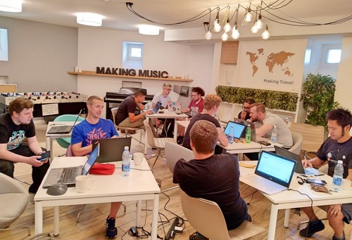 Developers working on Umbraco at a hackathon